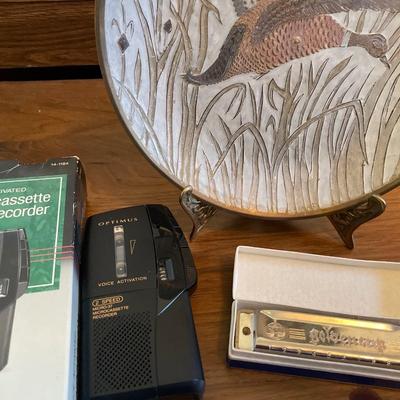 Harmonica, metal plate and micro cassette tape