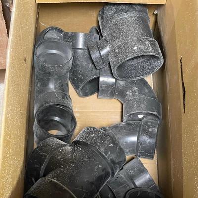 Box of Black 3" & 4" PVC plumbing connectors
