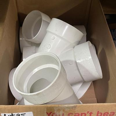 Box of large white 4" PVC Pipe Connectors