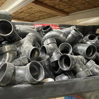 Husky tub full of black PVC connectors - maybe 2" - Great Husky storage container