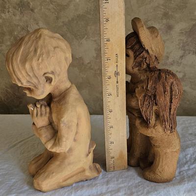 2 figurines, child praying, children playing Ann Entis, Lee Bortin