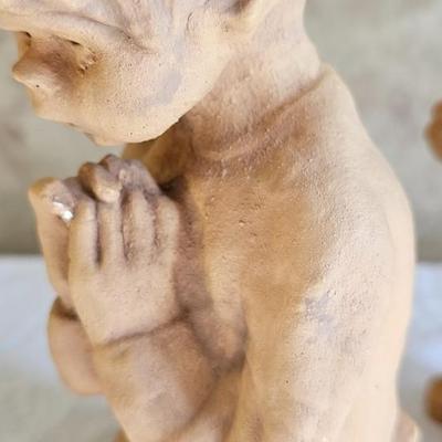 2 figurines, child praying, children playing Ann Entis, Lee Bortin