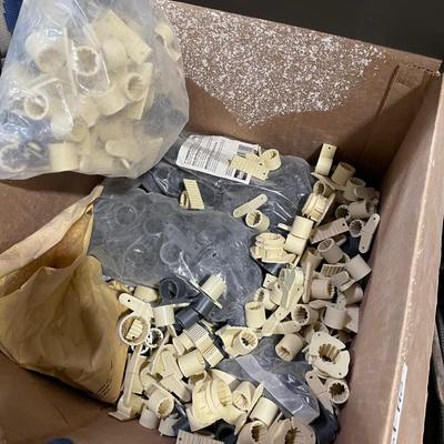 Box of plastic pipe clamps