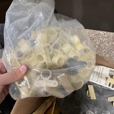 Box of plastic pipe clamps