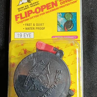 Butler Creek Scope covers new in package and a FN-FAL Tac Trigger