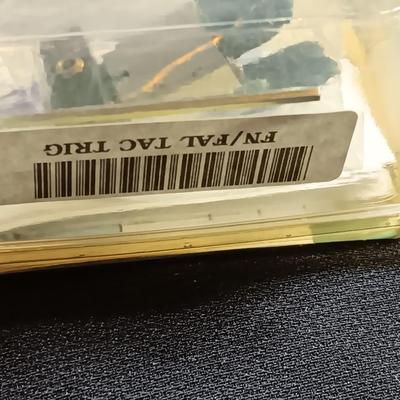 Butler Creek Scope covers new in package and a FN-FAL Tac Trigger