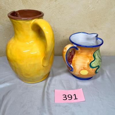 2 Earthenware pitchers