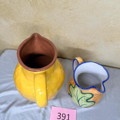 2 Earthenware pitchers