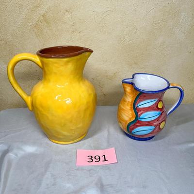 2 Earthenware pitchers