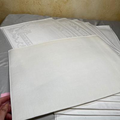 White brocade place mats