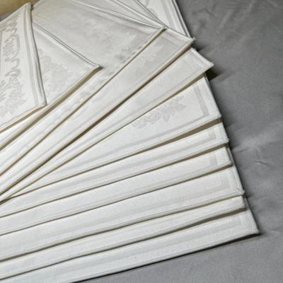 White brocade place mats