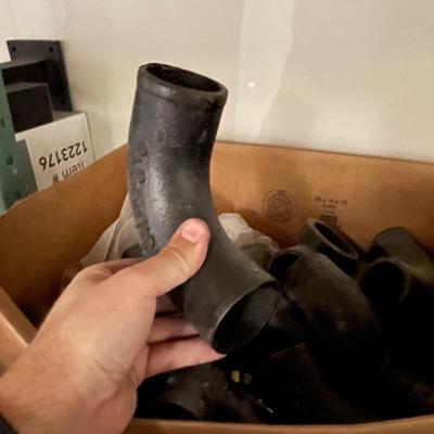 Box of 2" steel pipe connectors
