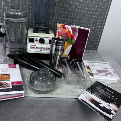 Vitamix with Extras: Recipe Book, Tamper etc.. 2 Pitchers and Lids,