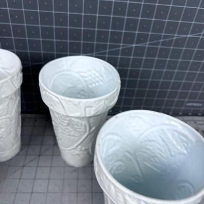 4 White Metal Vases,
