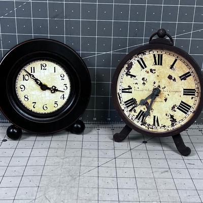 2 Decorative Clocks, 1 is a Howard Miller 
