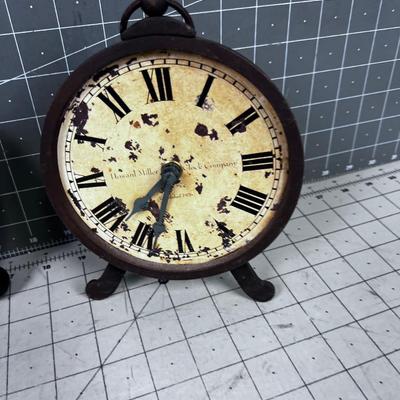 2 Decorative Clocks, 1 is a Howard Miller 