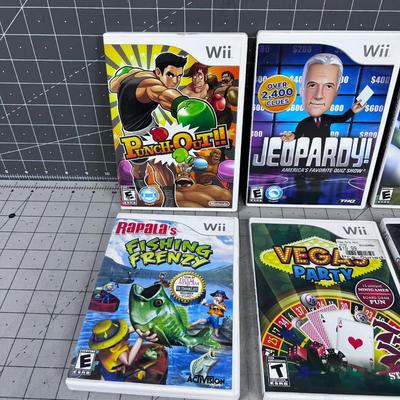 Wii Games; Jeopardy, Pin Ball, Fishing (6) 