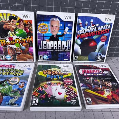 Wii Games; Jeopardy, Pin Ball, Fishing (6) 