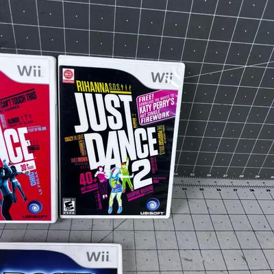 Wii  Games: ( 3)  Just Dance and Rock Band 