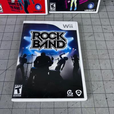 Wii  Games: ( 3)  Just Dance and Rock Band 