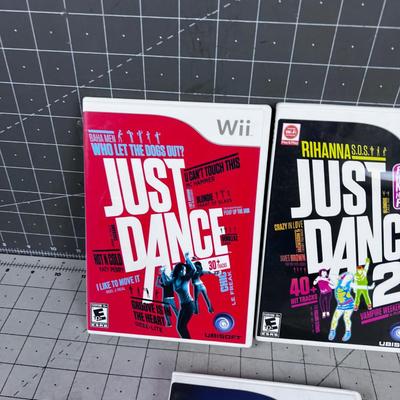 Wii  Games: ( 3)  Just Dance and Rock Band 