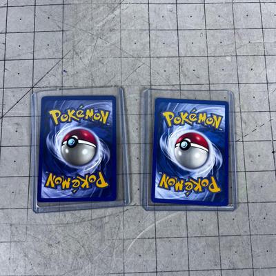 2 Vintage PokÃ©mon Cards in Sleeves 