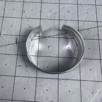 Simple Silver Cuff with a small Braid Design