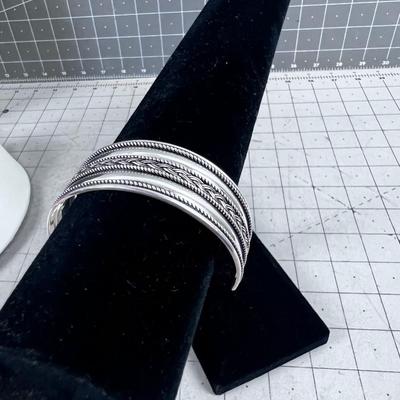 Simple Silver Cuff with a small Braid Design