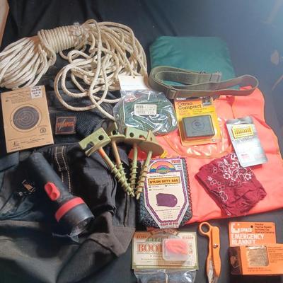 Backpack with a variety of survival gear