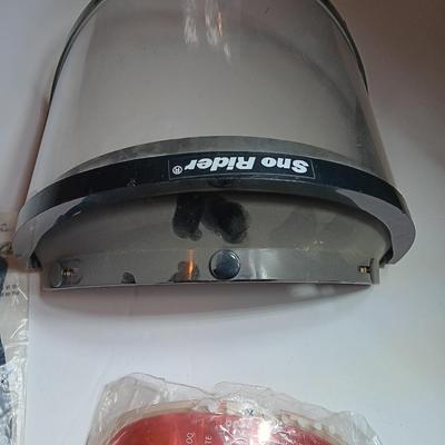 Snow guard for helmet - snow goggles and other snow mobile accessories