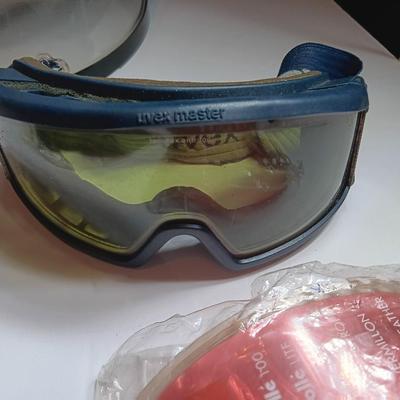 Snow guard for helmet - snow goggles and other snow mobile accessories