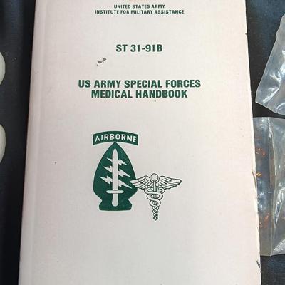 Medical supplies and US ARMY SPECIAL FORCES MEDICAL HANDBOOK