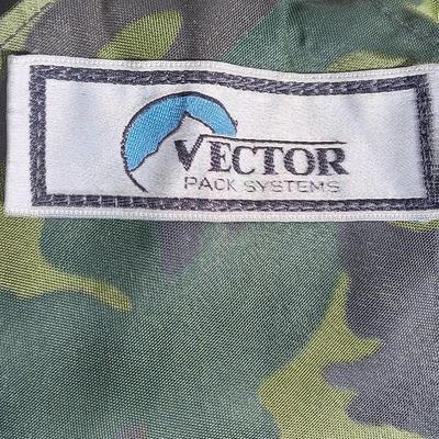 Vector pack systems camo canvas bag with camouflage hat and pouch and canteen.