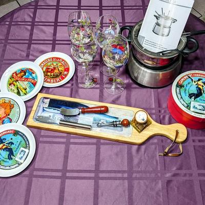 Entertainment Lot: Fondue Set, hand painted wine glasses(4), French cheese plate box set, glass cheeseboard with knife and spreader and 2...