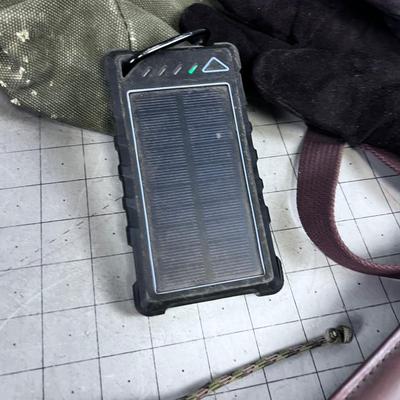 Mixed Lot of Outdoor Gear; Pouches, Tent Pegs, Elk Call, Yeti Cup, Solar Charger