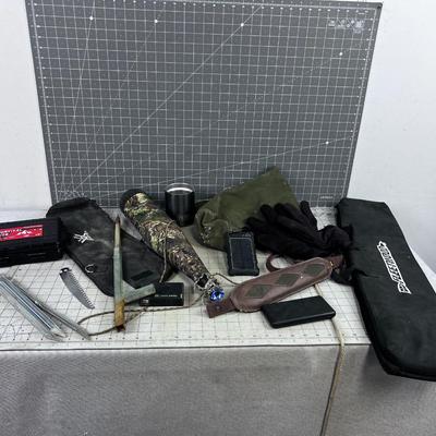 Mixed Lot of Outdoor Gear; Pouches, Tent Pegs, Elk Call, Yeti Cup, Solar Charger
