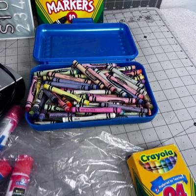Tote of Crayons and more Crayons Plus Art & Crafting. 