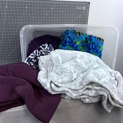 Tub Full of Fleece Blankets 