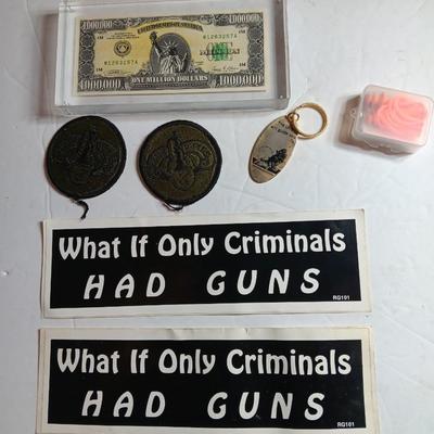 Variety of items - Million-dollar bill - Military patches - Bumper stickers -