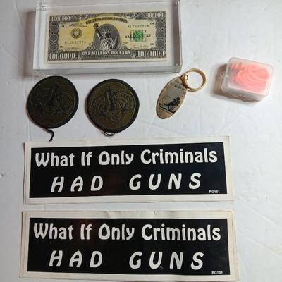 Variety of items - Million-dollar bill - Military patches - Bumper stickers -