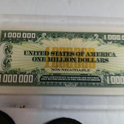 Variety of items - Million-dollar bill - Military patches - Bumper stickers -