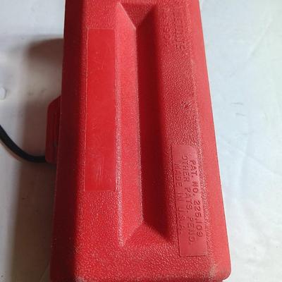 Orange security warning flasher / siren light with vintage metal battery operated head lamp and flashlight.
