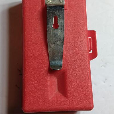 Orange security warning flasher / siren light with vintage metal battery operated head lamp and flashlight.
