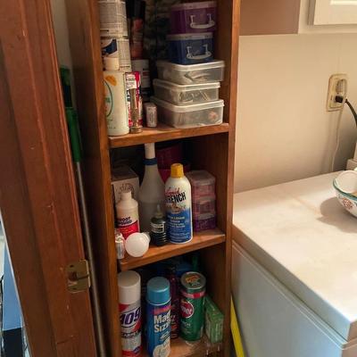Shelving with paints and cleaners
