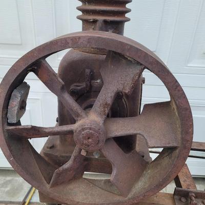 Antiques Curtis compressor on stand with wheels.