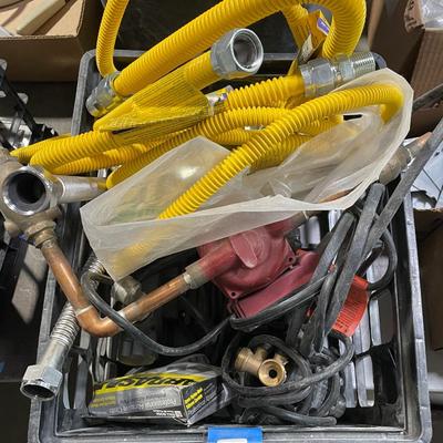 Crate lot of flexible gas hoses & other misc. plumbing fixtures - 2 small electric pumps
