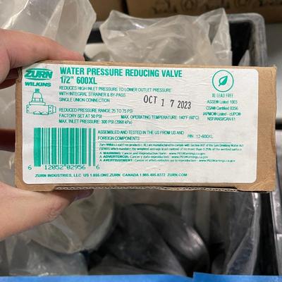 Crate of Misc. plumbing fixtures & water pressure reduction valve