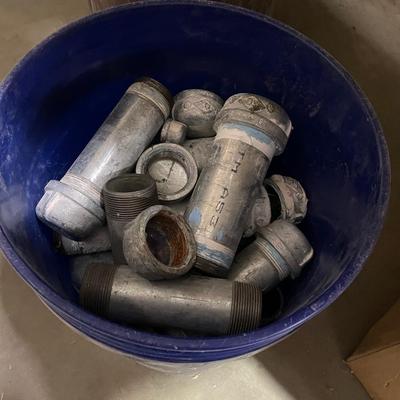 Bucket of Galvanized threaded Steel Pipes & Caps - METAL