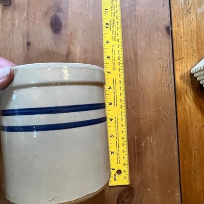 Crock jar of utensils