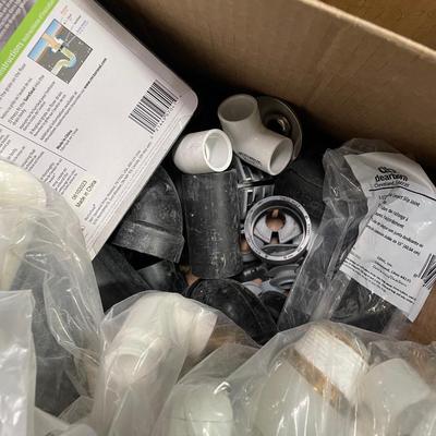Box of PVC pieces - look to be 1-1/2" assorted pieces - elbows, corners, etc
